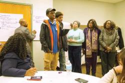 Teens who are part of the Violence Intervention Prevention initiative discussed their project at a meeting at the Mattapan Center for Life last week. 	Caleb Nelson photo